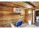 Office features all-wood construction, wall-mounted white shelves and storage, and an open doorway at 1155 Cope Rd, Martinsville, IN 46151