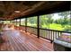 Large covered porch offers scenic views with ample seating, perfect for relaxation at 1155 Cope Rd, Martinsville, IN 46151