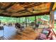 Enjoy outdoor seating and porch swings on this expansive, covered porch at 1155 Cope Rd, Martinsville, IN 46151