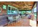 Spacious covered porch with outdoor seating, ideal for entertaining or relaxing at 1155 Cope Rd, Martinsville, IN 46151