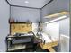 Workshop featuring painted walls, pegboard, work bench, shelving and overhead lighting at 1155 Cope Rd, Martinsville, IN 46151