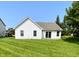 Picture of backyard with well-maintained lawn and siding on a sunny day at 1173 Carlton Ct, Greenwood, IN 46143