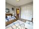 Cozy bedroom with a charming bed, closet, and a decorative rug at 1173 Carlton Ct, Greenwood, IN 46143