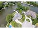 Gorgeous waterfront home with expansive backyard, pool, and private boat dock at 12208 Island Dr, Indianapolis, IN 46256