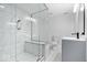 Modern bathroom features a glass shower, sleek fixtures, and marble tile at 12208 Island Dr, Indianapolis, IN 46256