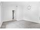 Bright bedroom with base molding, neutral carpet, and a modern chandelier at 12208 Island Dr, Indianapolis, IN 46256