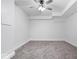 Bedroom featuring neutral carpet, white walls, and ceiling fan at 12208 Island Dr, Indianapolis, IN 46256