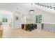 Elegant dining area with modern chandelier, stylish table and bar area at 12208 Island Dr, Indianapolis, IN 46256