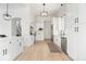 Expansive kitchen featuring an island, stainless appliances, and bright white cabinets at 12208 Island Dr, Indianapolis, IN 46256