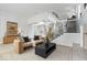 Spacious living room with fireplace, grand staircase and neutral decor at 12208 Island Dr, Indianapolis, IN 46256