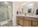 Updated bathroom with double vanity and a large, glass-enclosed tiled shower at 12251 E 196Th St, Noblesville, IN 46060