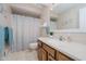 This bathroom is complete with tiled floors, wood cabinets, and a shower with a curtain at 12251 E 196Th St, Noblesville, IN 46060