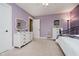 The bedroom features purple walls, carpeted floors, and white trim at 12251 E 196Th St, Noblesville, IN 46060