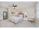 This primary bedroom features a ceiling fan and comfortable carpet at 12251 E 196Th St, Noblesville, IN 46060