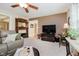 Relaxing living room with modern entertainment center and stone fireplace at 12251 E 196Th St, Noblesville, IN 46060
