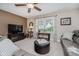 Cozy living room with a ceiling fan, lots of natural light, and comfortable seating at 12251 E 196Th St, Noblesville, IN 46060