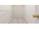 A simple walk-in closet with standard wire shelving and neutral carpet at 1309 Wyoming Way, Anderson, IN 46013
