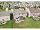 Expansive backyard featuring a stone patio and outdoor pergola with outdoor seating at 14453 Glapthorn Rd, Fishers, IN 46037