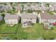 Aerial view of home in a suburban neighborhood with a patio, a grill, green grass, and privacy fences at 14453 Glapthorn Rd, Fishers, IN 46037