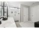 Contemporary bathroom with dual sinks, tiled shower, and modern finishes at 14453 Glapthorn Rd, Fishers, IN 46037