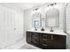 Stylish bathroom with dual sinks, modern fixtures, and elegant design at 14453 Glapthorn Rd, Fishers, IN 46037