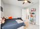 Fun bedroom with sports-themed decor and a bright display shelf for books and balls at 14453 Glapthorn Rd, Fishers, IN 46037