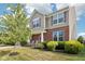 Charming two-story home with brick accents, well-maintained lawn and landscaping at 14453 Glapthorn Rd, Fishers, IN 46037