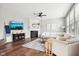 Bright living area featuring a fireplace, and comfortable seating at 14453 Glapthorn Rd, Fishers, IN 46037