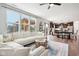 Open concept living area with hardwood floors, and a view to the kitchen at 14453 Glapthorn Rd, Fishers, IN 46037