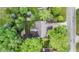 Bird's-eye view of the home featuring a well-maintained roof and lush, mature trees at 1482 Waterford Dr, Zionsville, IN 46077