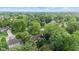 A wide shot of many houses surrounded by lush, mature landscaping at 1482 Waterford Dr, Zionsville, IN 46077