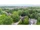 Scenic aerial shot of a residential area featuring tree-lined streets and well-maintained homes at 1482 Waterford Dr, Zionsville, IN 46077