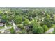 Picturesque neighborhood showcasing homes surrounded by lush greenery and mature trees, and neat roads at 1482 Waterford Dr, Zionsville, IN 46077