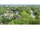 An aerial view displaying a neighborhood with mature trees and beautiful landscaping at 1482 Waterford Dr, Zionsville, IN 46077