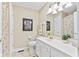 Well-lit bathroom with a spacious vanity, neutral tones, and a full-sized mirror at 1482 Waterford Dr, Zionsville, IN 46077