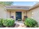 Inviting front entrance with stylish door, enhanced by two rocking chairs at 1482 Waterford Dr, Zionsville, IN 46077