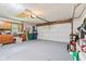 Clean and spacious two car garage with painted floor and storage space at 1482 Waterford Dr, Zionsville, IN 46077