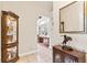 Open hallway leads to adjacent rooms with stylish furnishings at 1482 Waterford Dr, Zionsville, IN 46077