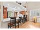 Spacious kitchen counter bar with seating, connecting to the living room at 1482 Waterford Dr, Zionsville, IN 46077