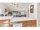 Kitchen counter overlooks living room, showcasing the open floorplan at 1482 Waterford Dr, Zionsville, IN 46077