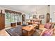 Inviting living room features a large window, plush seating, and a decorative area rug at 1482 Waterford Dr, Zionsville, IN 46077