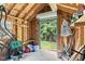Bright and spacious interior of the storage shed, featuring an open door and organized storage at 1482 Waterford Dr, Zionsville, IN 46077