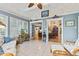 Bright sun room looking into living room and dining room, vaulted ceiling at 1482 Waterford Dr, Zionsville, IN 46077