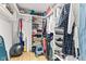 Organized walk-in closet with shelving and clothing racks at 1482 Waterford Dr, Zionsville, IN 46077