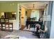 View of a dining area featuring a table, chairs, a decorative lamp, and a rocking horse at 162 W Robertson Rd, Morgantown, IN 46160