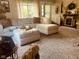 Comfortable living room with plush seating and a cozy fireplace, perfect for relaxing at 162 W Robertson Rd, Morgantown, IN 46160