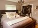 View of a main bedroom with a bed with pillows, a closet, and decor accents at 162 W Robertson Rd, Morgantown, IN 46160