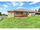 Beautiful brick home featuring a spacious wooden deck overlooking a lush green lawn on a sunny day at 177 Jacinta Pl, Bargersville, IN 46106
