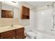Functional bathroom featuring a vanity, medicine cabinet, toilet and tub with shower at 177 Jacinta Pl, Bargersville, IN 46106