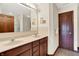 Bathroom with dual sinks, large mirror, and a glass-enclosed shower at 177 Jacinta Pl, Bargersville, IN 46106